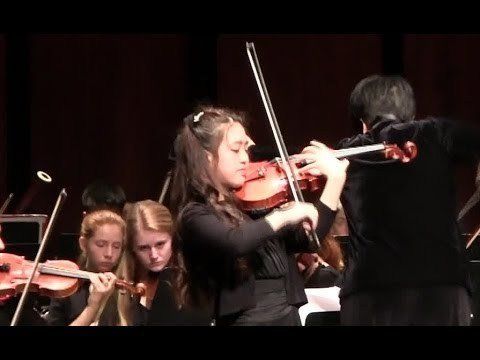 Young girls playing violin