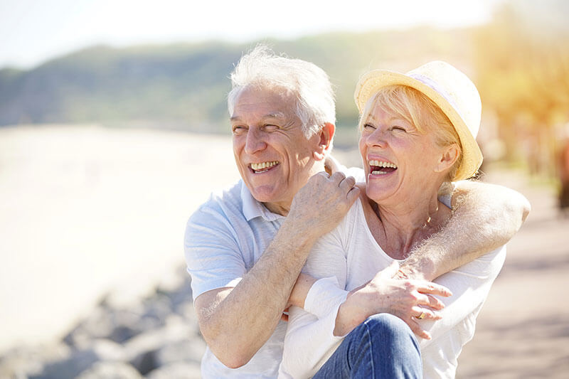 Happy elderly couple outdoors