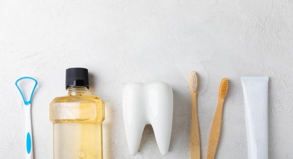mouthwash bamboo toothbrushes tongue scrapper and toothpaste