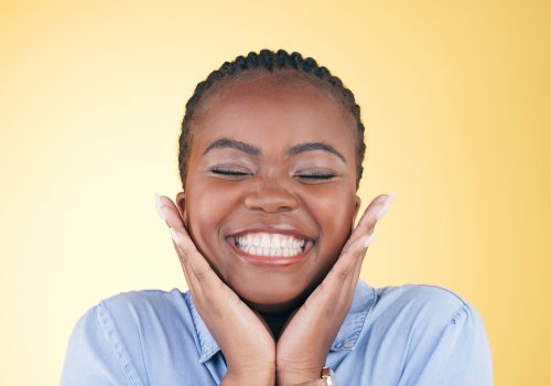 beautiful happy black woman smiles