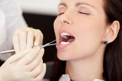 patient gets dental exam