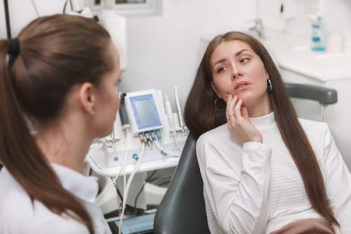 Woman unhappy at the dentist